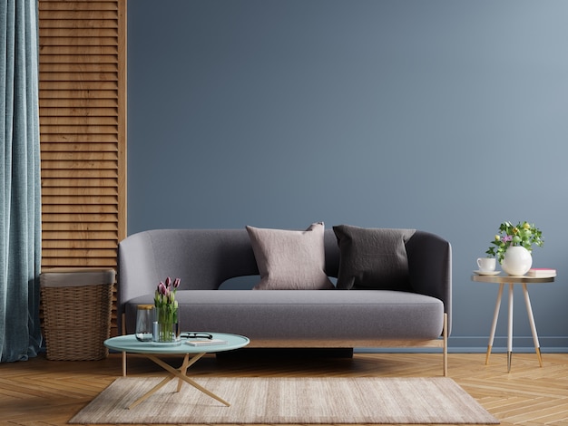 Dark modern interior design mockup with sofa on empty dark blue wall background.3D rendering