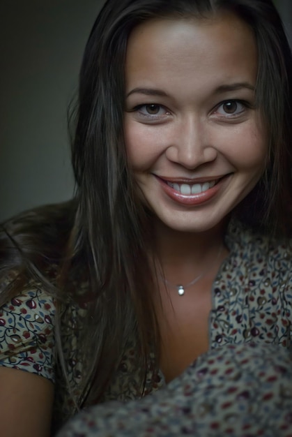 Dark portrait of a beautiful girl with a healthy smile