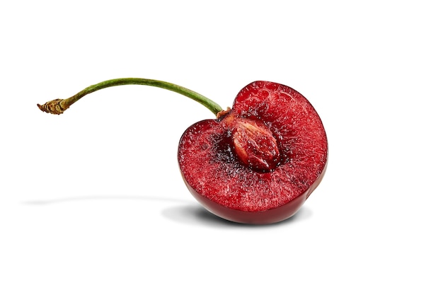 Dark red sweet cherries with stems isolated