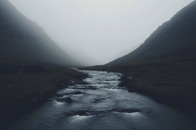 Photo a dark river snaking through a fogcovered valley