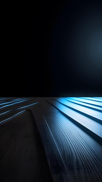 A dark room with a wooden floor and a blue light on the wall.