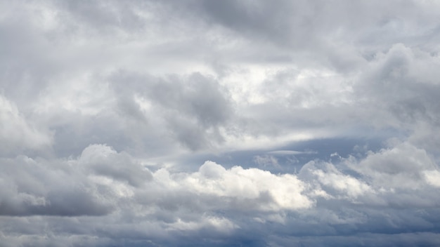 The dark sky is covered with solid gray clouds