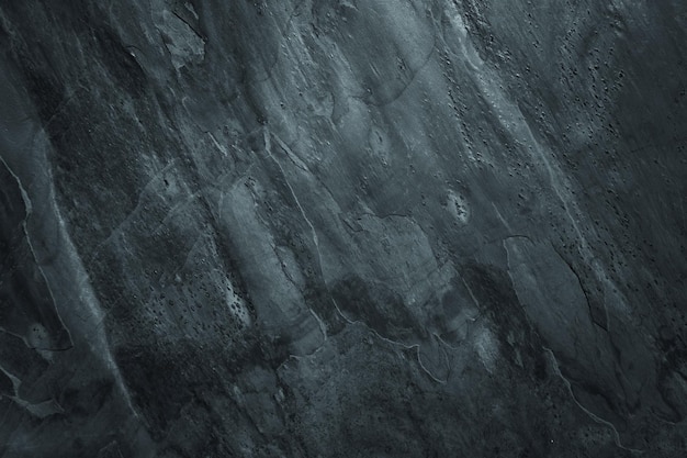 Dark worn surface background with grunge rough peeled texture