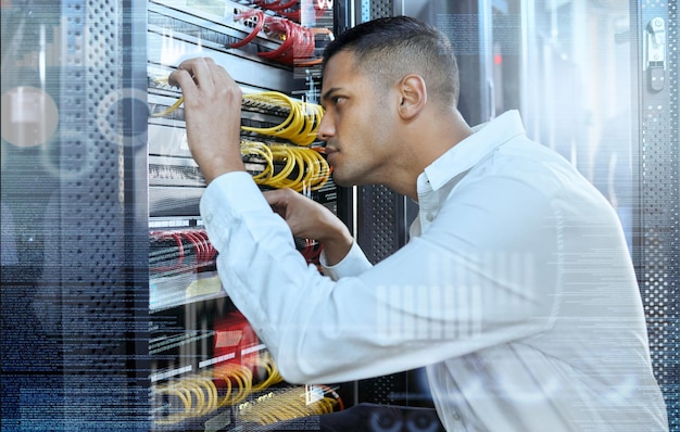 Data center IT technician and man in server room for 404 error glitch and cybersecurity with cables for motherboard maintenance and assessment Engineer working on connection for digital network