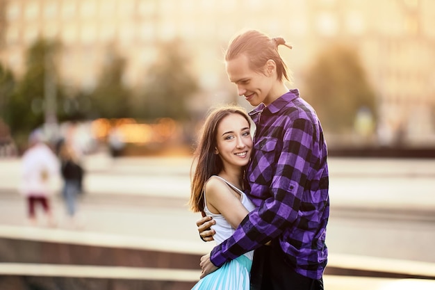 Date of happy young couple outdoors at summer