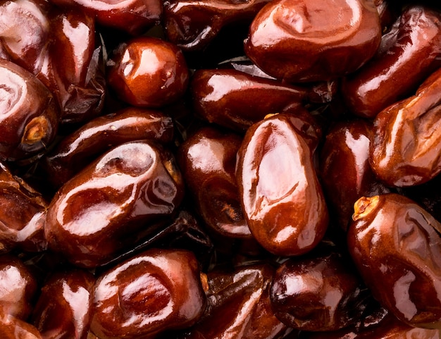 Dates fruit close-up, background. The view of the top.