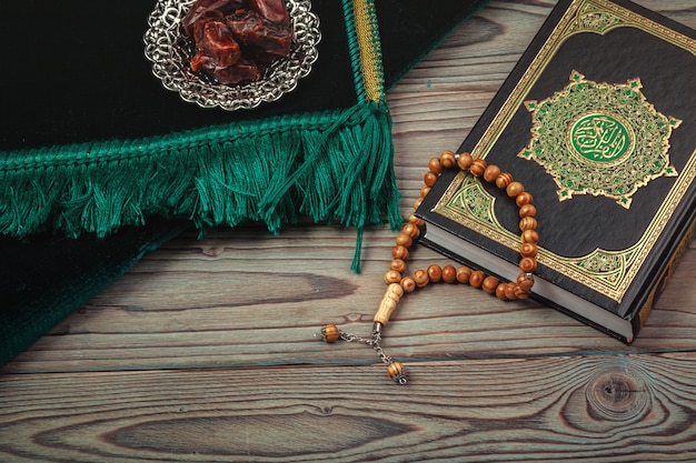 Dates with rosary and The holy book of Quran