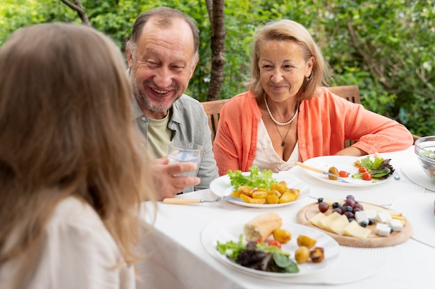 Daughter visiting her parents for a lunch at their house