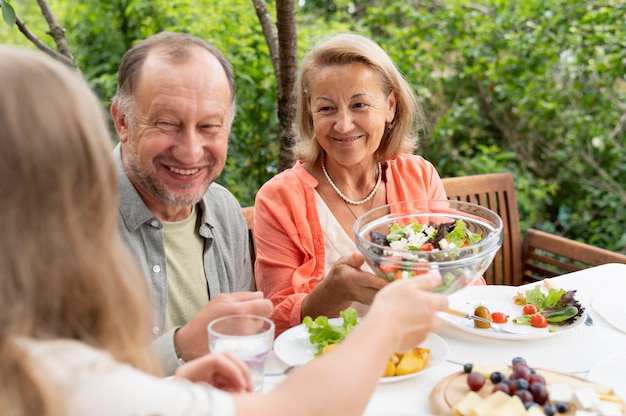 Daughter visiting her parents for a lunch at their house