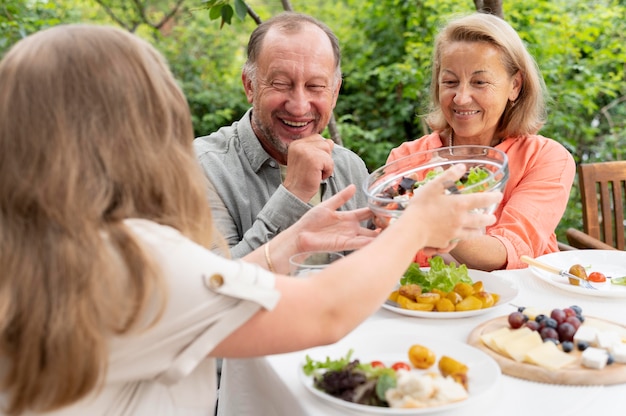 Daughter visiting her parents for a lunch at their house