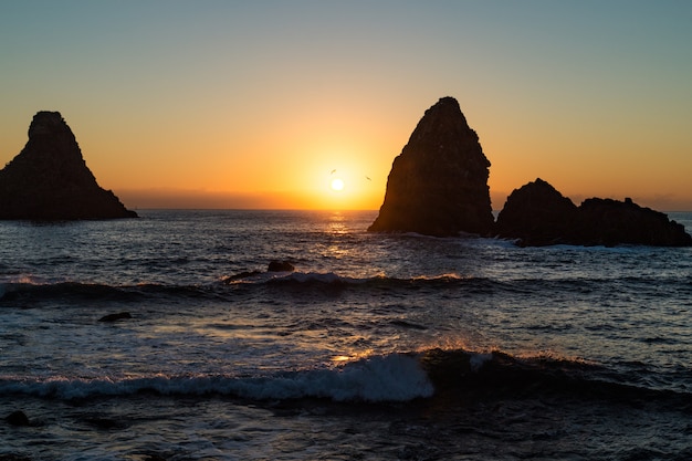 Dawn in the bay of Acitrezza, Sicily