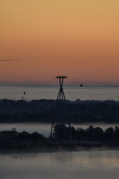 dawn over the cable car across the river