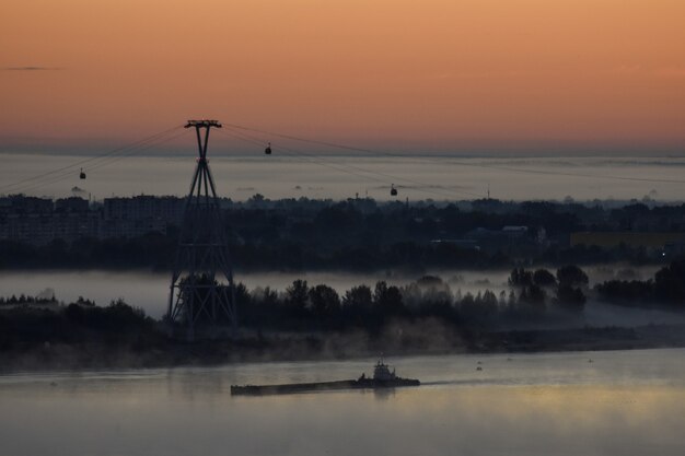 dawn over the cable car across the river