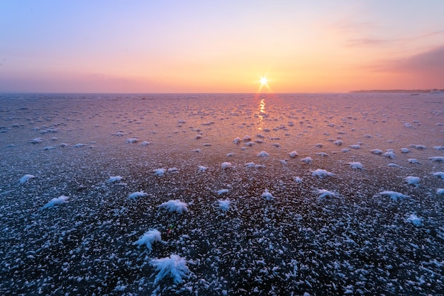 Dawn on an icy lake, dawn winter morning winter landscape