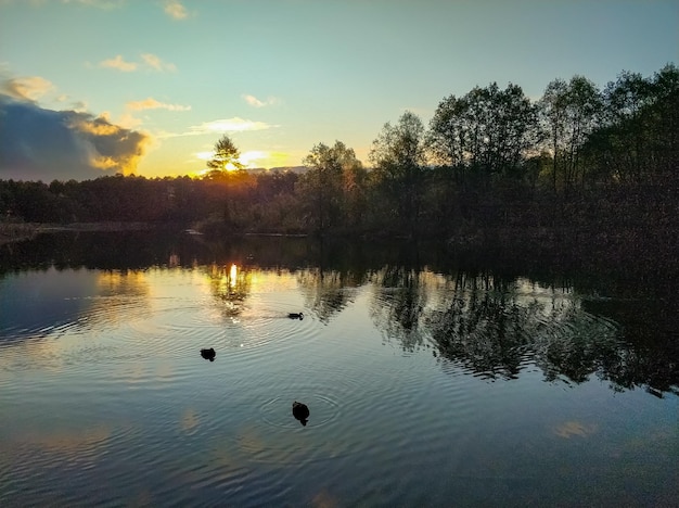 Dawn of the sun on a blue lake in Kazan