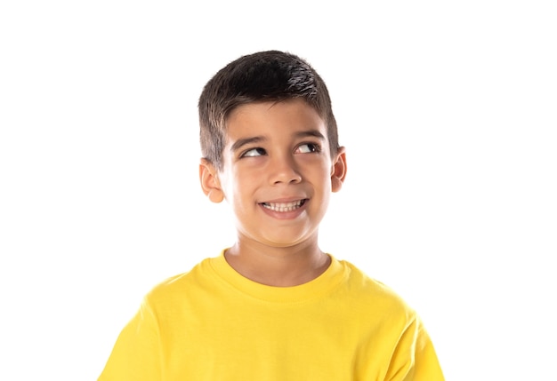 Daydreaming boy looking up isolated on a white background