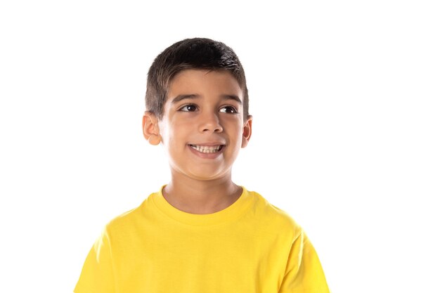 Daydreaming boy looking up isolated on a white background