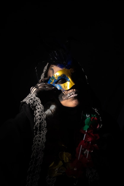 The death. Artistic makeup representing death in a carnival costume play,