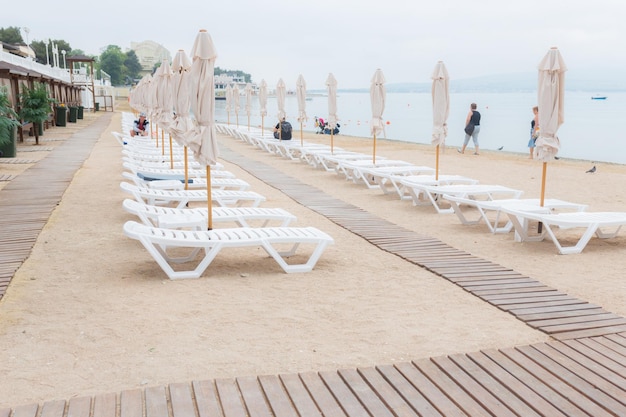 Deck chairs and umbrellas on the beach