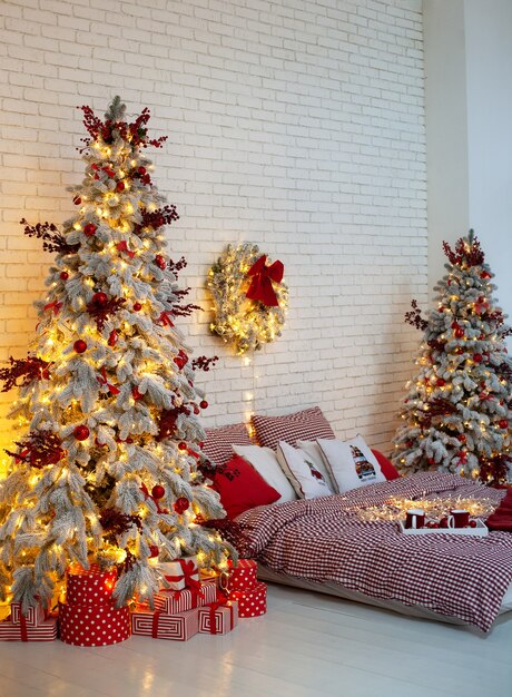 Decorated bedroom for Xmas holidays with Christmas tree