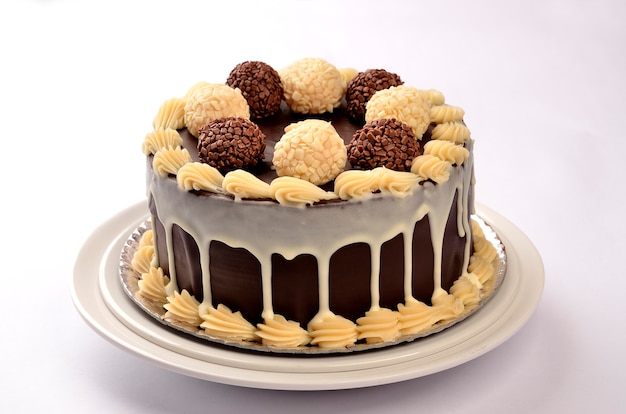 decorated birthday cake on a white plate