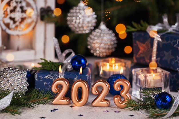 Decorated Christmas lantern with burning candle indoors