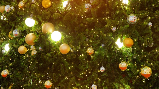 Decorated Christmas tree on blurred, sparkling and fairy