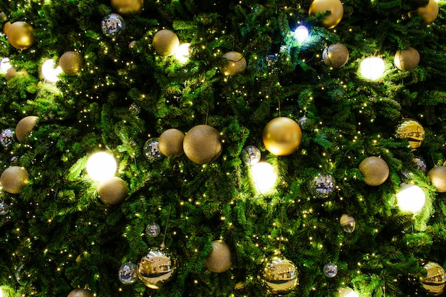 Decorated Christmas tree in silver and gold theme.