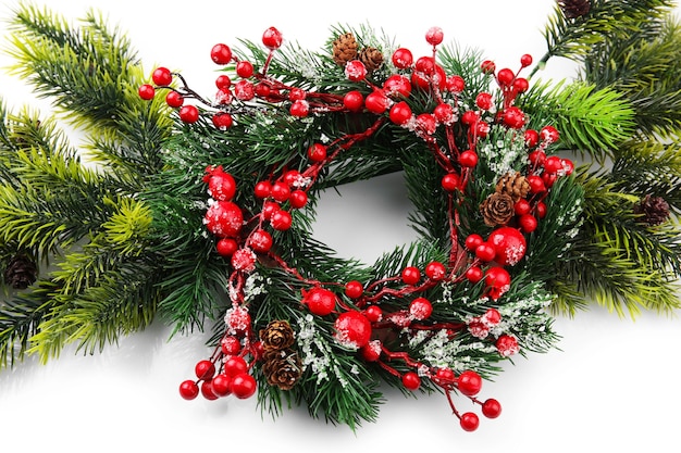 Decorated Christmas wreath on white background