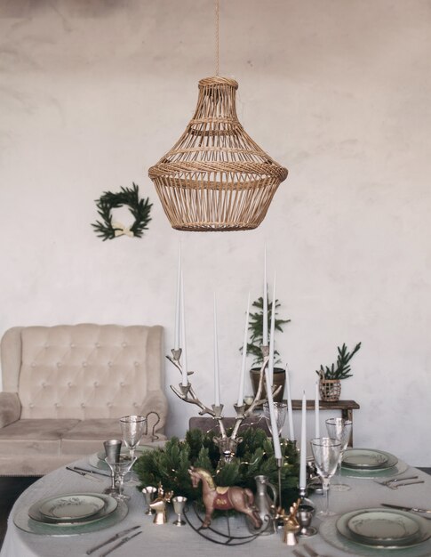 Decorated living room and festive table for the new year. Christmas decor