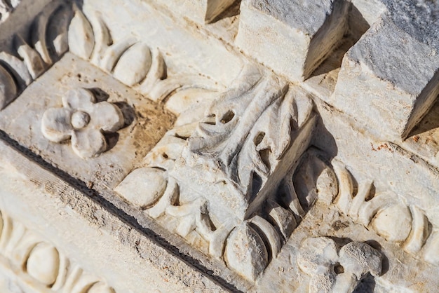 Decoration of an ancient building with plaster stucco closeup