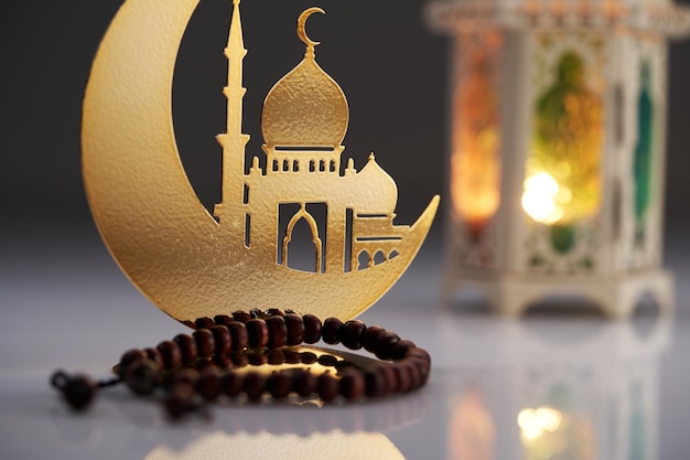 decoration metal crescent mosque and prayer beads and arabic lantern