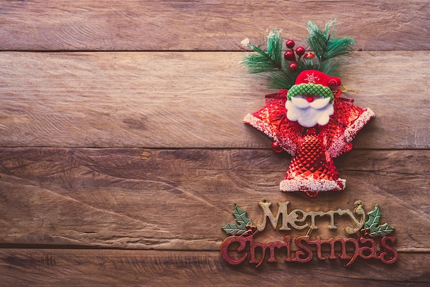 Decorations for Christmas placed on wooden floor