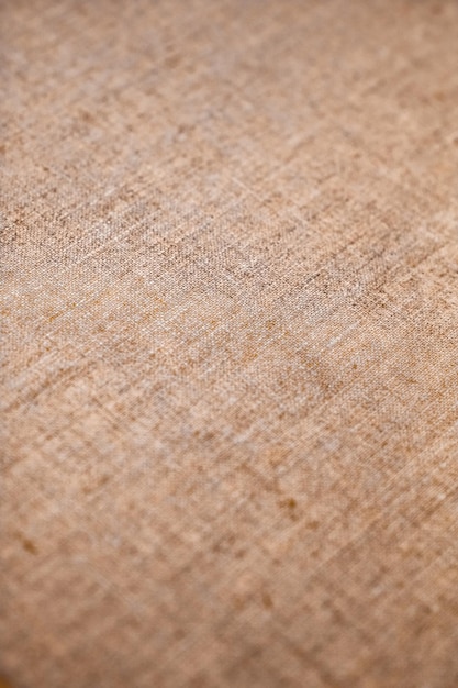 Decorative brown linen fabric textured background for interior furniture design and art canvas backdrop