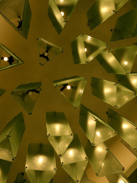 Decorative chandeliers standing on the ceiling