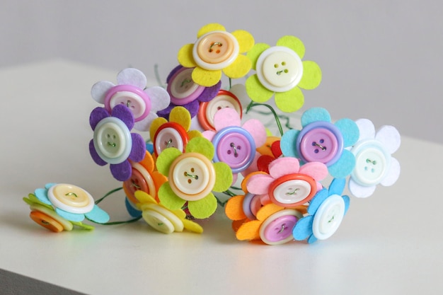 decorative flowers made of multicolored buttons