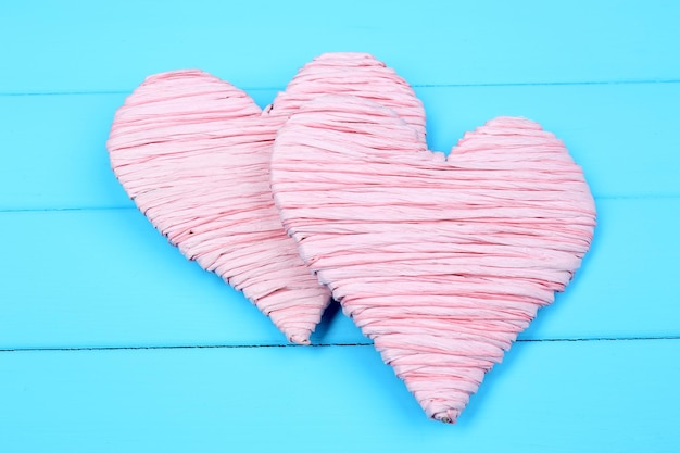 Decorative heart on wooden background