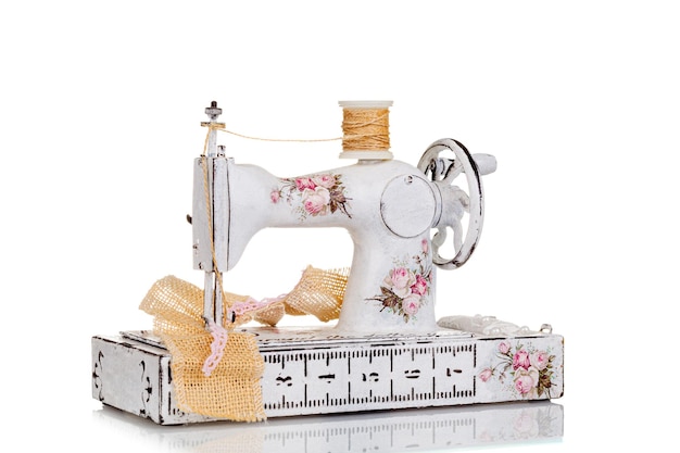 Decorative sewing machine on a white background