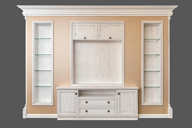 Decorative wall with stucco and builtin wooden bookcases and chest of drawers on grey background