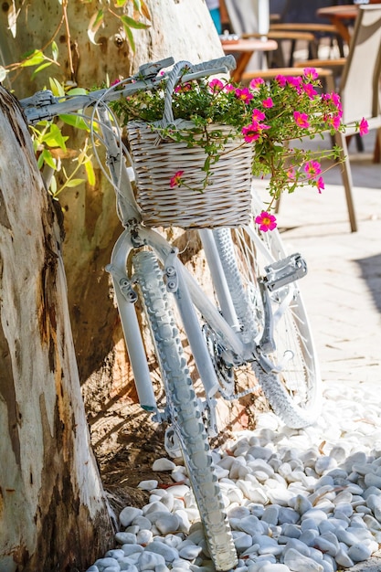 Decorative white bicycle with flowers