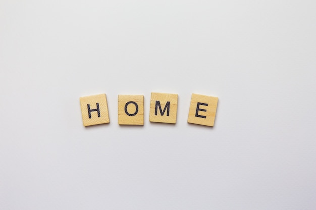 Decorative wooden letters forming the word home top view.