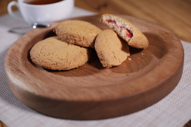 a decorative wooden plate is very beautiful for vegetables and cookies sweets and desserts