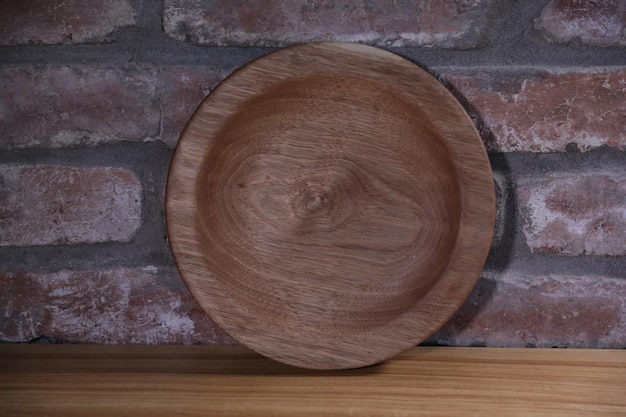 a decorative wooden plate is very beautiful for vegetables and cookies sweets and desserts