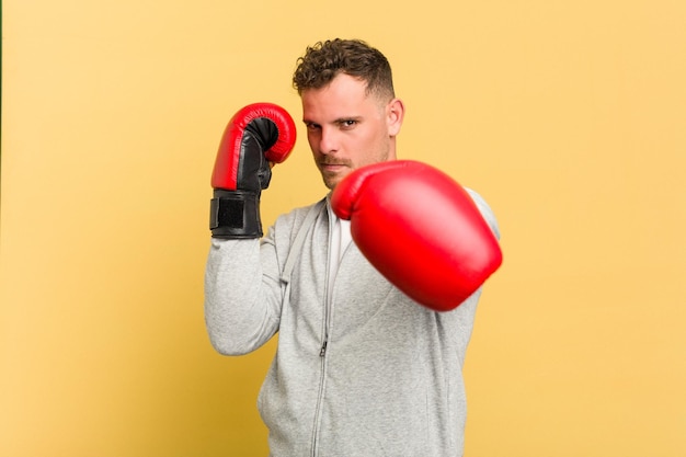 Dedicated and energetic, a Caucasian man practicing boxing is investing in his physical health and c