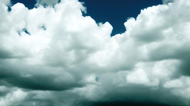 Deep blue skies with white clouds background