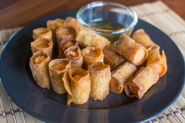 Deep fried sausage in wonton wrappers Thai food