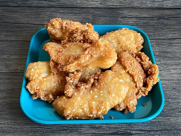 Deepfried sliced banana ready to eat on the wood background