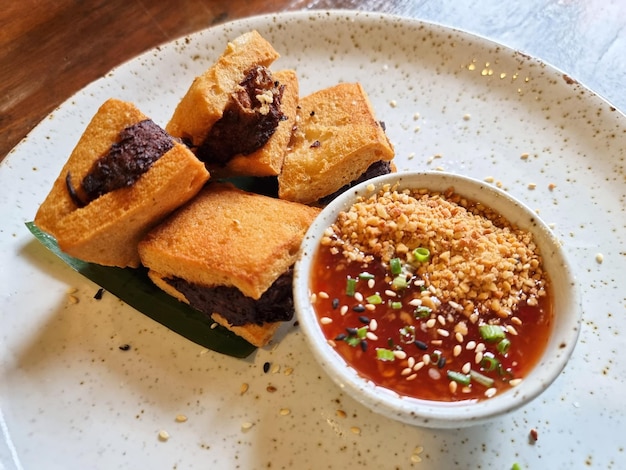 Deepfried tofu or fried bean curd with sweet and spicy sauce