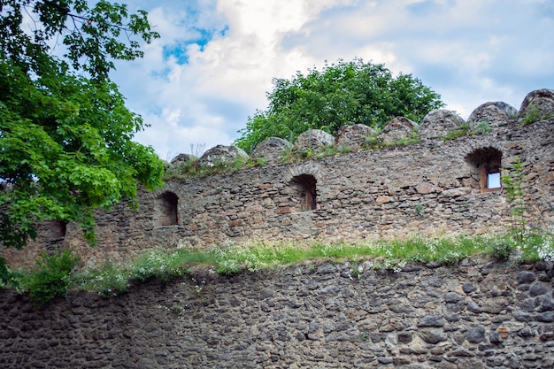 Defensive walls and fortifications of a medieval castle.