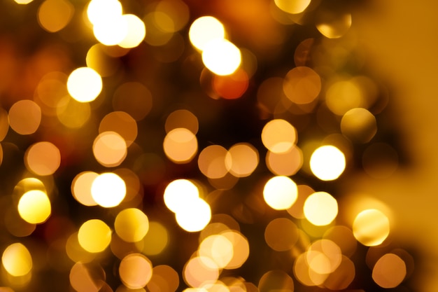 Defocused background with blinking lights of new year garland